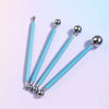 A set of four silver clay sculpting tools with light blue handles for pottery and crafting.