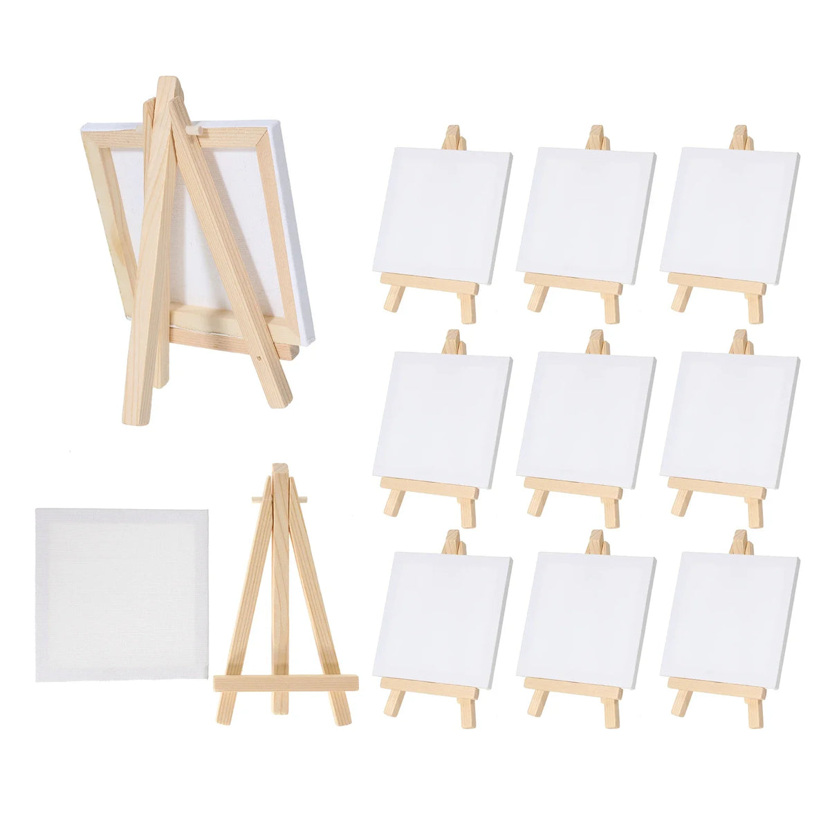 A set of mini wooden easels and white canvases for children's art projects.