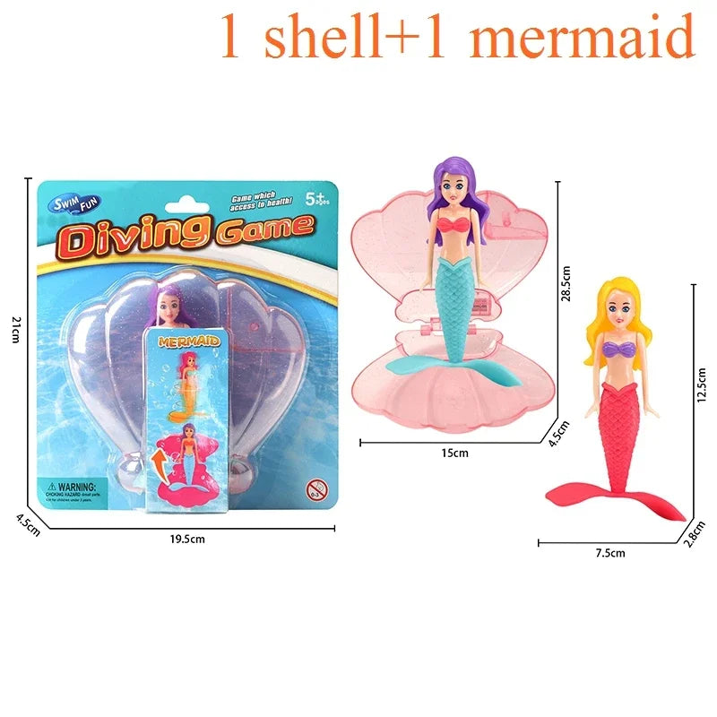 A pink mermaid diving game set featuring a mermaid figure and an opening shell.