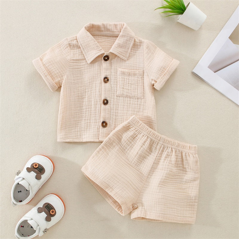 A beige linen shirt and matching shorts outfit set for a baby boy