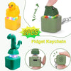 Two green duck and frog fidget keychains with sound and LED lights shown in various angles