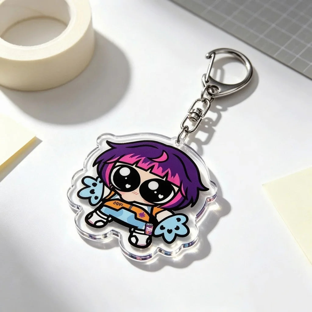 A clear acrylic keychain charm featuring an anime-style character with purple hair and blue clothing, attached to a silver ke