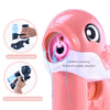Pink whale bubble gun with attachments demonstrating vertical tipping and side pouring without leakage