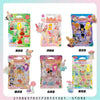 A collection of Sylvanian Families blind bag collectible figures in various packaging.