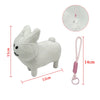 White plush rabbit stuffed toy with pink string and loop for play