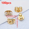 A collection of 100 stainless steel earring stud bases with backs shown on a white background.