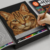 A close-up of a black book featuring a gold-colored cat mosaic for a color by number activity.