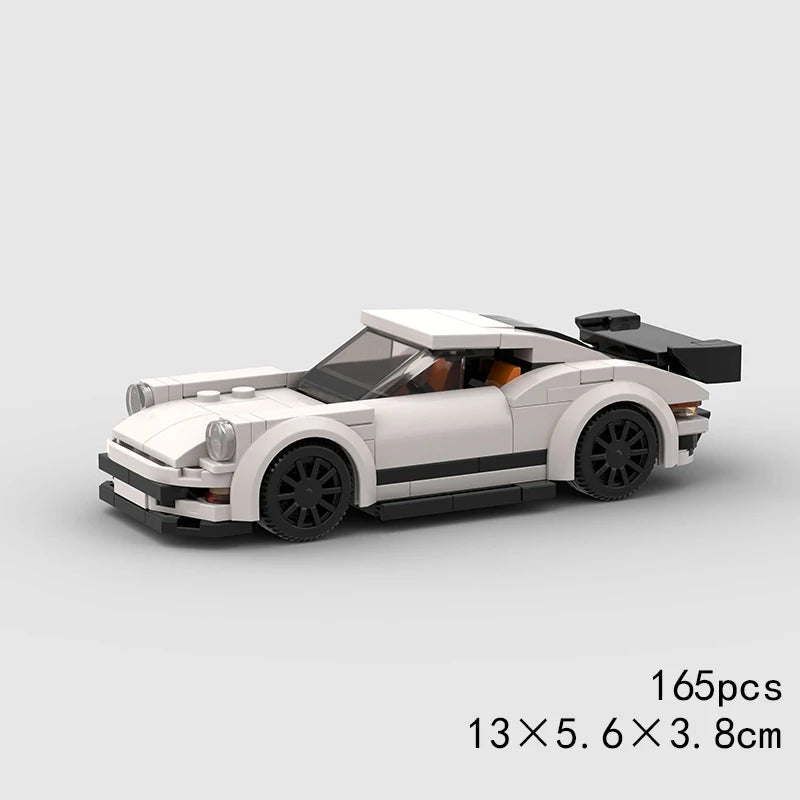 A white and black classic rally car building block set shown from the side.