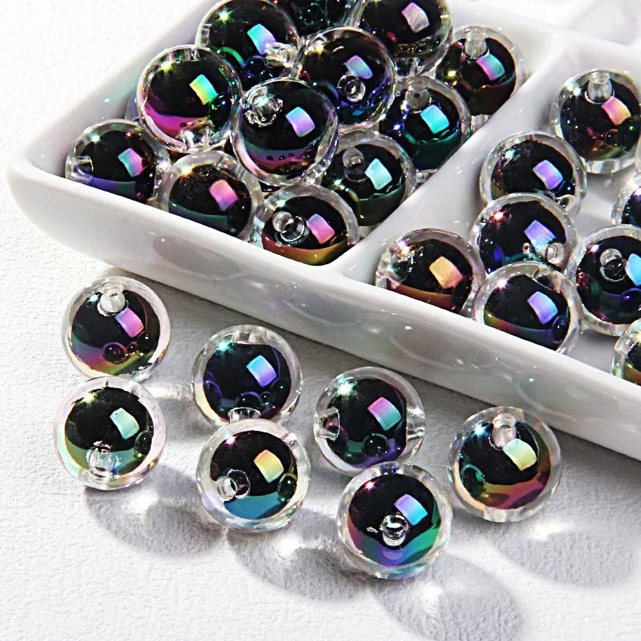A white dish filled with a mix of iridescent, multicolored acrylic craft beads for jewelry making.