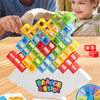 A collection of multi-sized, colorful plastic building blocks arranged in a geometric pattern on a white base.