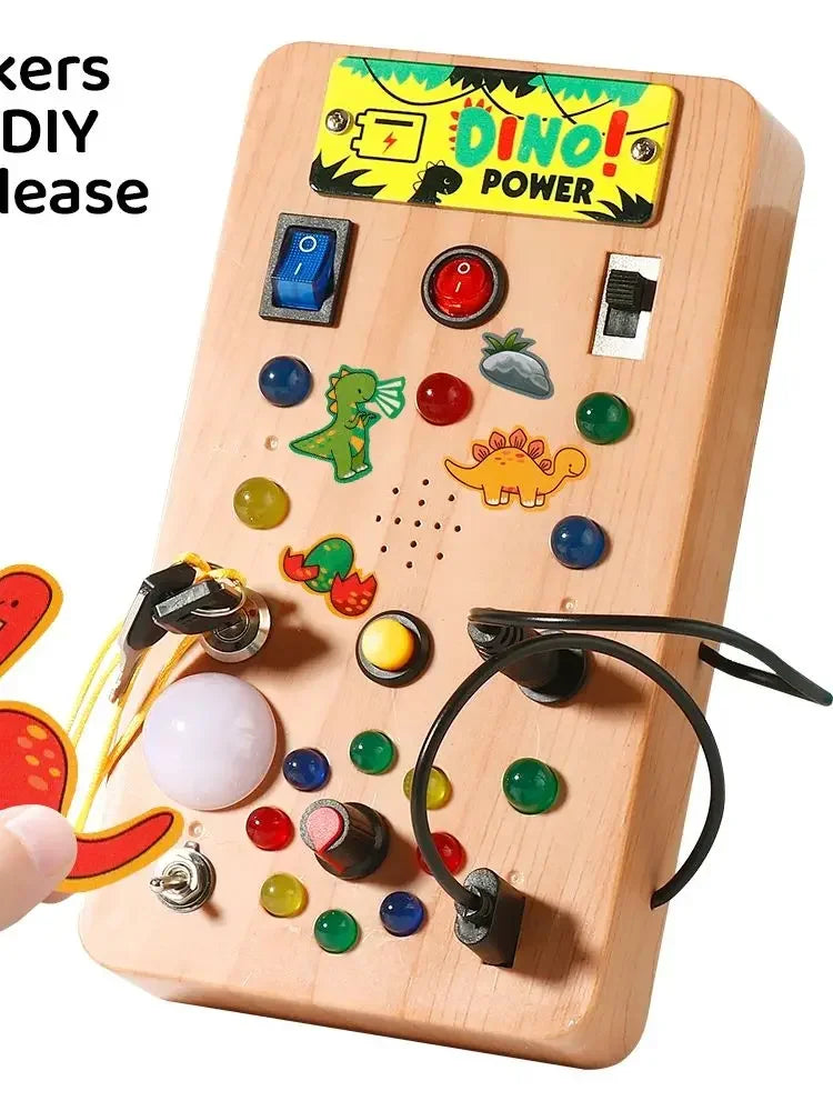 A wooden busy board featuring various interactive elements like switches, knobs, and buttons for children's learning.
