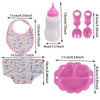 A set of pink doll feeding and care accessories including a bottle, feeding tools, and a pink tray.