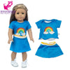 A doll wearing a blue outfit set consisting of a top, skirt, and tights.
