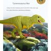 A green Tyrannosaurus Rex dinosaur model is displayed in a natural outdoor setting.