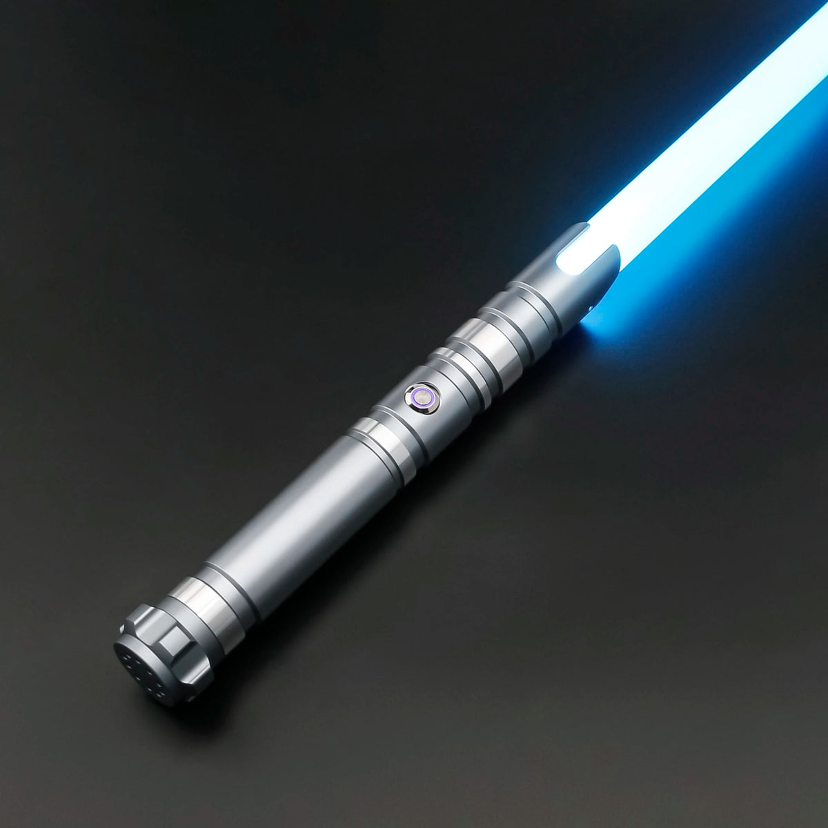 A silver lightsaber with a glowing blue blade is shown diagonally against a dark background.