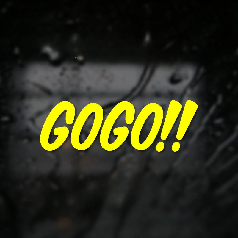 Yellow text saying GOGO!! on a dark, blurry background.