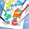 A white sheet of paper is filled with various colored pencils, crayons, markers, and paint pens used for children's drawing.