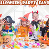 Halloween party favors featuring a pumpkin carved toy set and colorful sticky climbing toys