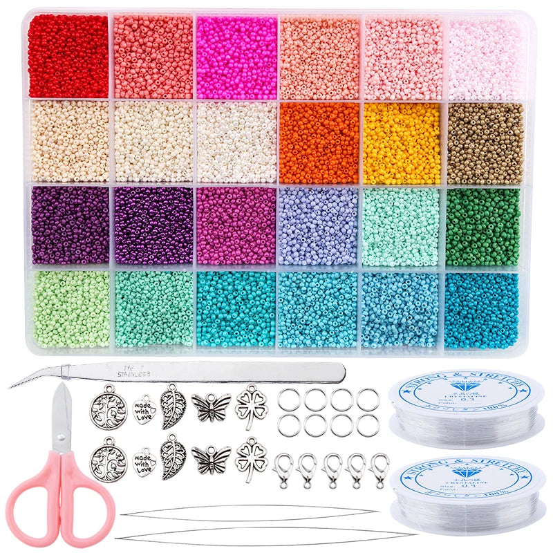 A variety of colored glass seed beads in various shades are displayed in compartments, along with jewelry making tools like p