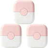A pink and white 2-in-1 baby hair cutting comb with a dual-edge blade shown from above.