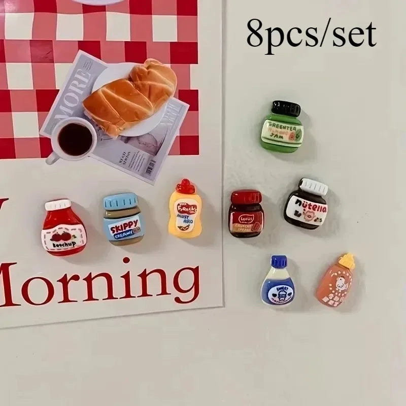 A set of eight kawaii jam jar fridge magnets featuring various food items like toast and jam.