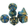 A set of polyhedral dice featuring a deep blue cosmic effect and gold numbering.