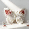 White silicone mold shaped like a rose butterfly for candle making and DIY crafts
