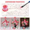 An unfinished painting guide showing line art and a paintbrush next to finished floral paintings.
