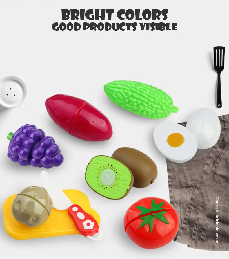A collection of bright colored pretend play fruit and vegetable cutting toys including a watermelon, eggplant, and tomato.