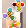 A set of three colorful suction cup spinner bath toys featuring animals like a bee, a smiling face, and a striped fish.