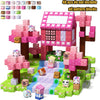 A set of pink and purple magnetic building blocks shaped like a castle, including various pattern blocks.