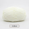 A ball of white pre-dyed milk cotton yarn for knitting and crochet.