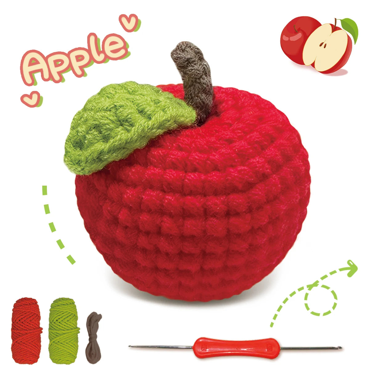 A red crocheted apple with a green leaf and a brown stem, next to yarn and a crochet needle.