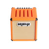 Orange guitar pick holder with a speaker-shaped design and the word ORANGE on the front.