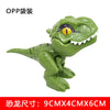 A green finger dinosaur fidget toy with movable joints, featuring a yellow eye and sharp teeth.