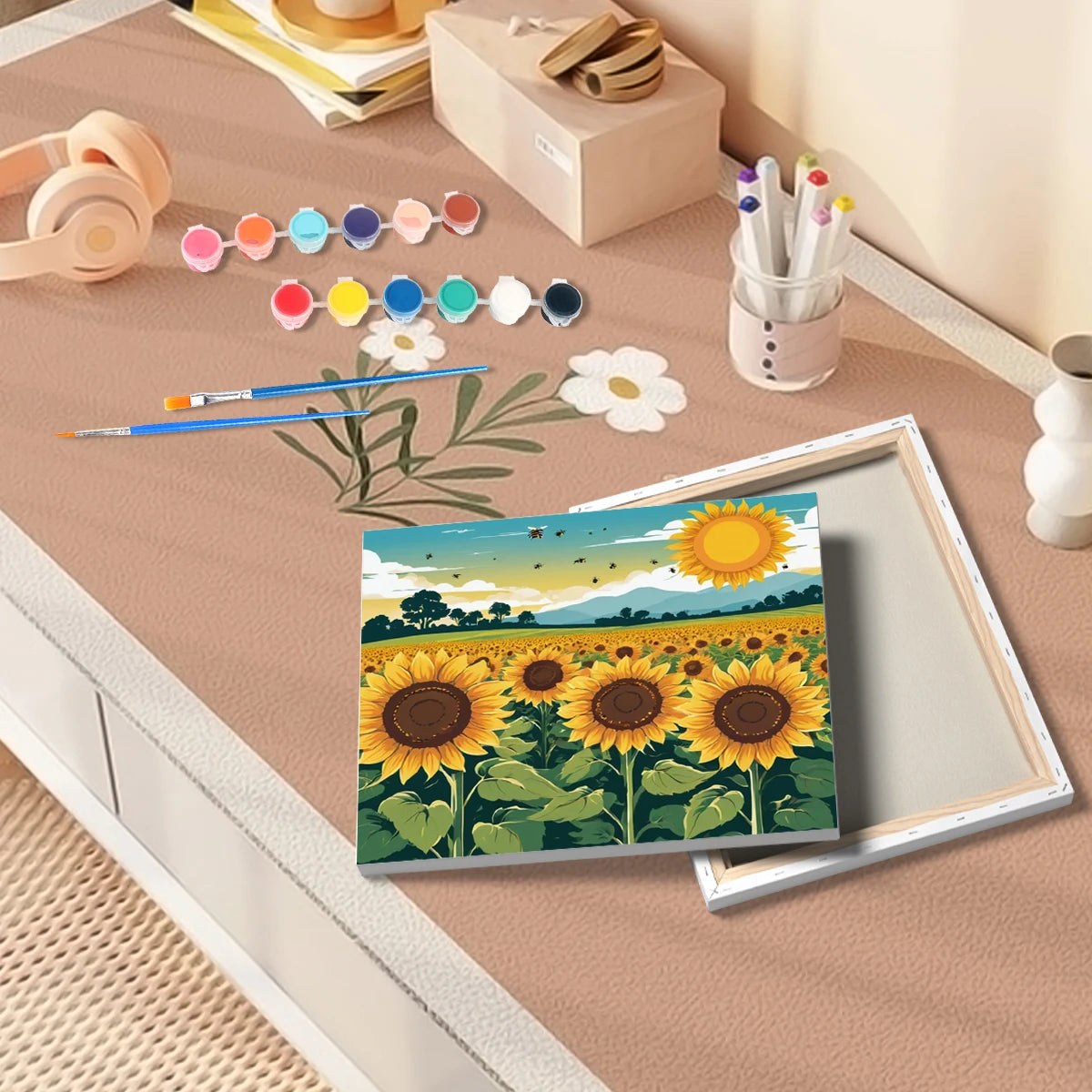 A framed paint by numbers kit featuring a sunflower field and green foliage on canvas.