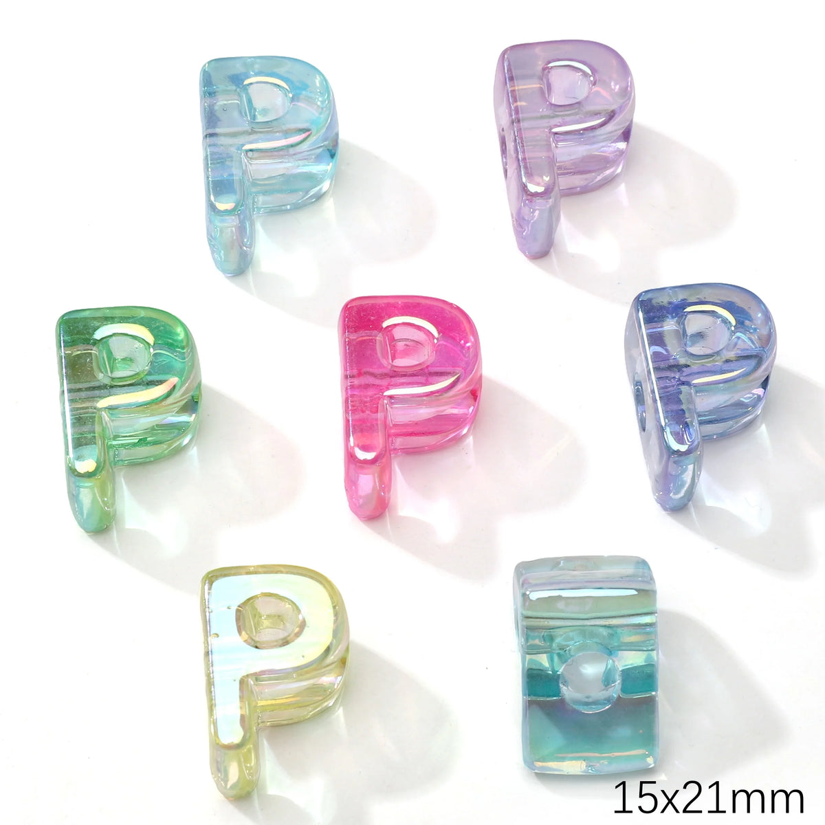 A collection of colorful acrylic letter P beads in various shades including blue, pink, and green.