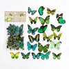 A sheet of colorful butterfly stickers for scrapbooking and journaling, featuring various green, yellow, and black butterflie