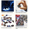 A hand holds a piece of an urban oil painting jigsaw puzzle, showing the quality and fit of the pieces.