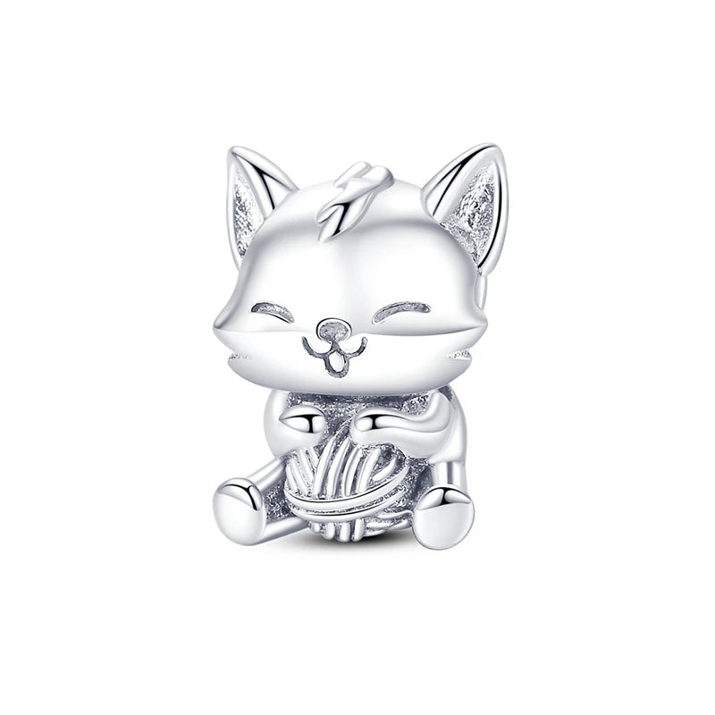 A sterling silver cat charm bead used for DIY bracelet making.