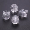 Three clear glass charm pendants shaped like lilies of the valley for jewelry making