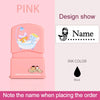 A pink waterproof labeling stamp featuring a bathtub design for custom kids names.