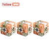 Three pieces of a yellow 3D maze puzzle ball for a brain teaser challenge