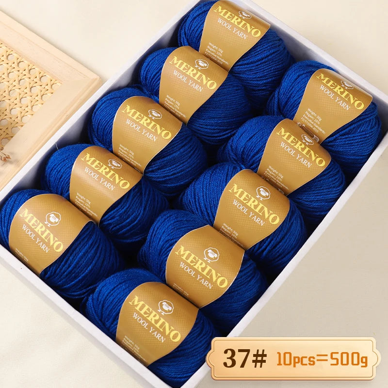 A box of Merino wool yarn balls with yellow labels showing the weight 37# and quantity 10 pieces totaling 500g