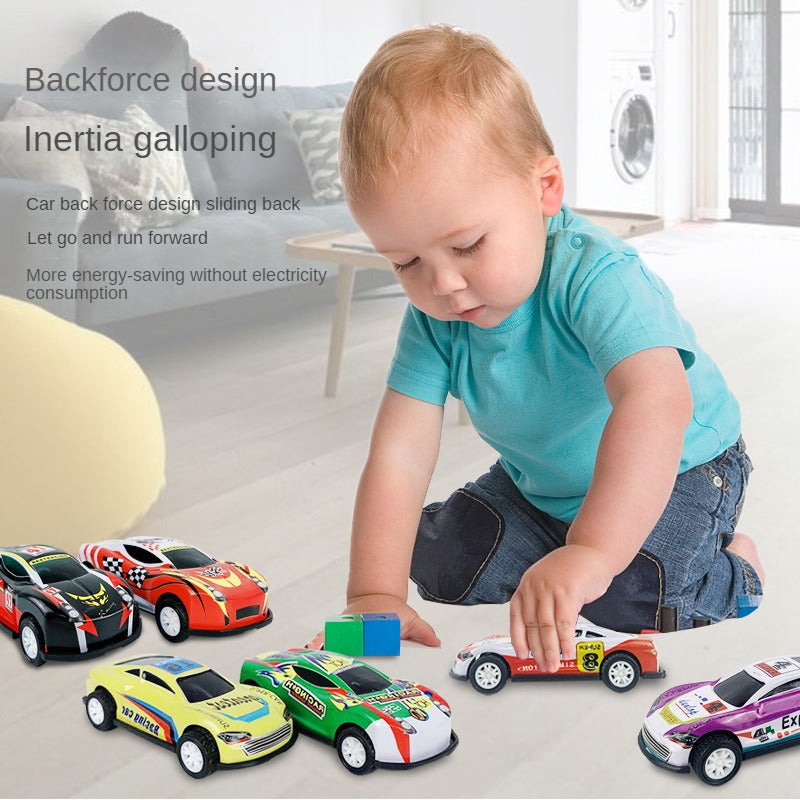 A toddler is playing with a 12-pack diecast alloy racing car set featuring various colored cars.