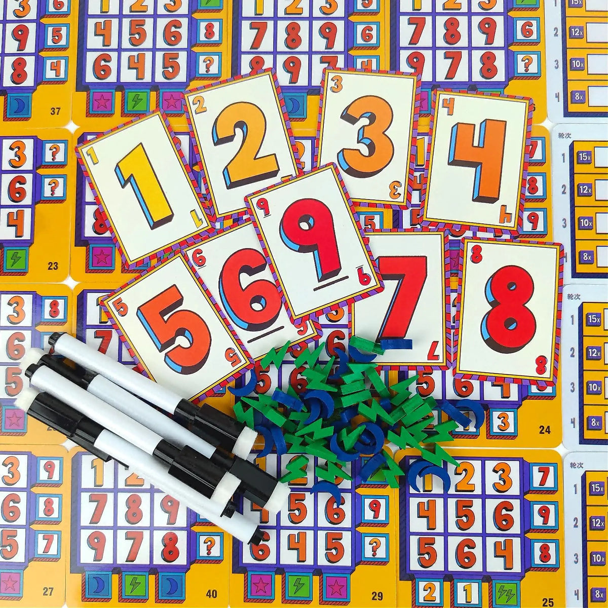A colorful board game layout featuring numbered cards and components for a family game.