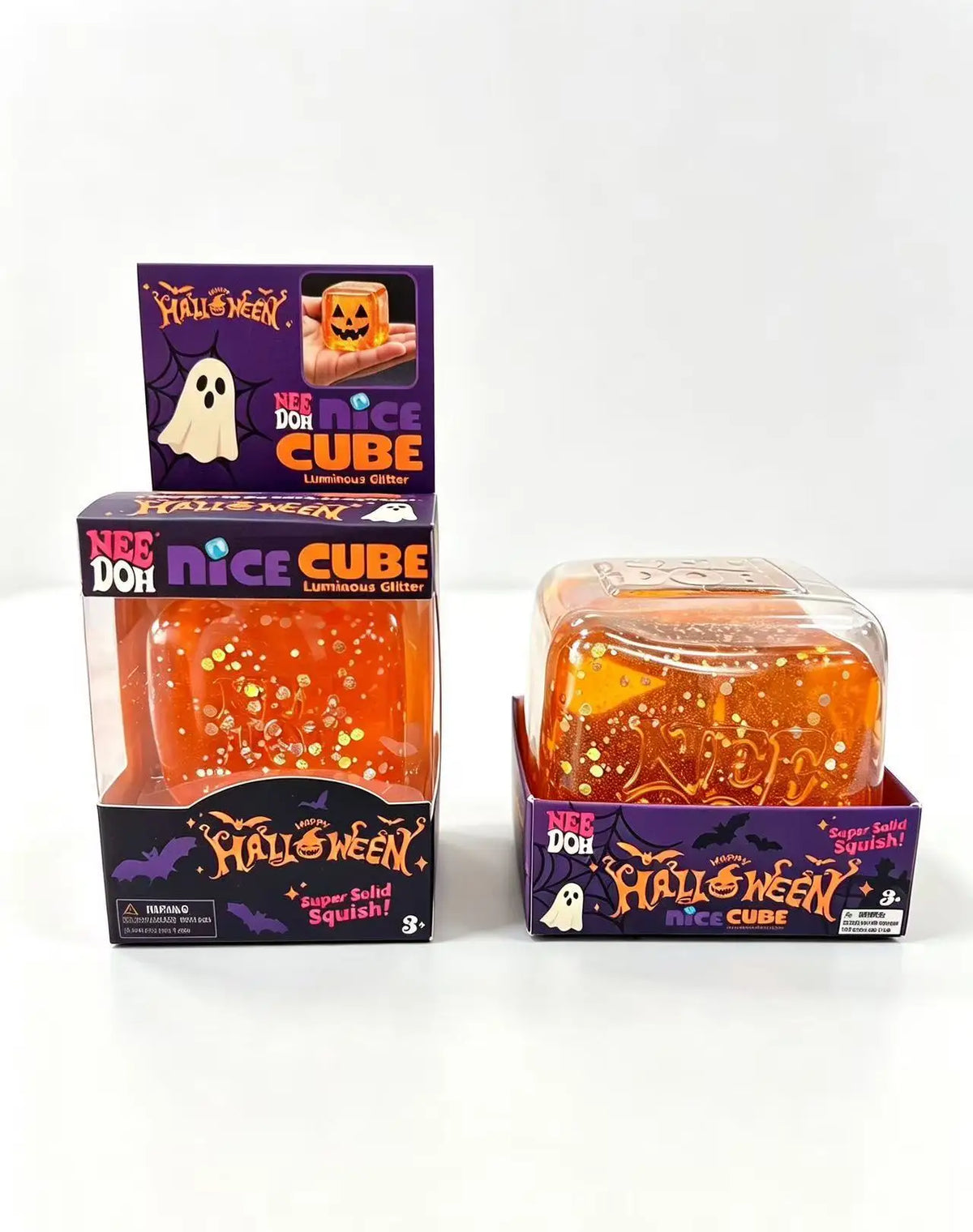 A box of Halloween Nice Cube squishy fidget toy in orange packaging with a glowing cube visible.