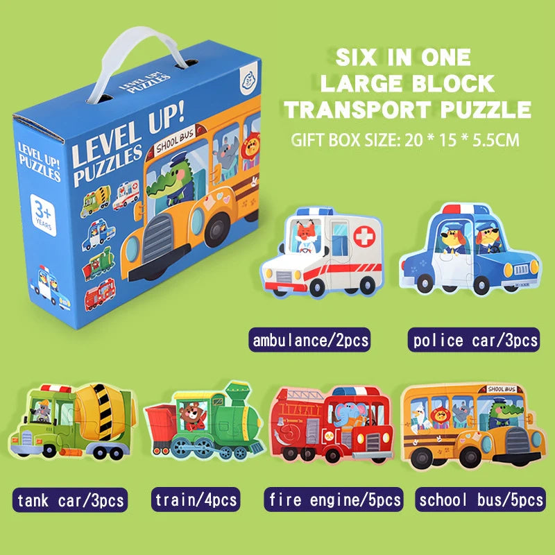 A gift box containing six large block transport puzzles including an ambulance, police car, tank car, train, fire engine, and