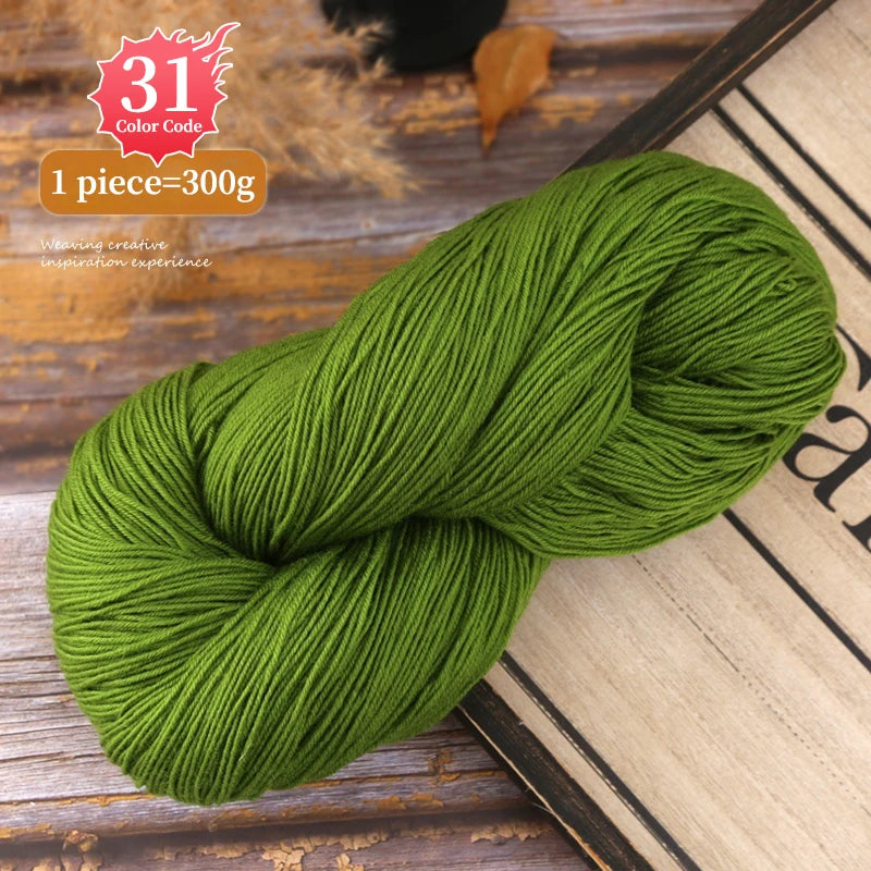 A ball of bright green yarn is shown on a wooden surface next to a color code label.