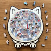 A wooden jigsaw puzzle shaped like a cat, featuring 135 unique pieces.